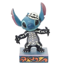 Enesco Jim Shore Disney Stitch Glow-in-the-Dark Skeleton Figurine, 6.38"
